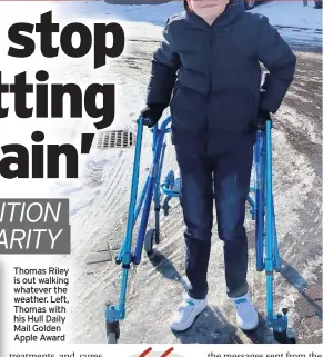  ??  ?? Thomas Riley is out walking whatever the weather. Left, Thomas with his Hull Daily Mail Golden Apple Award