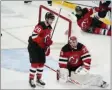  ?? FRANK FRANKLIN II - THE ASSOCIATED PRESS ?? New Jersey Devils goaltender Mackenzie Blackwood (29) and teammates Damon Severson
(28) and P.K. Subban react after Washington Capitals’ Carl Hagelin scored a goal during the third period of an NHL hockey game Sunday, April 4, 2021, in Newark, N.J. The Capitals won 5-4.