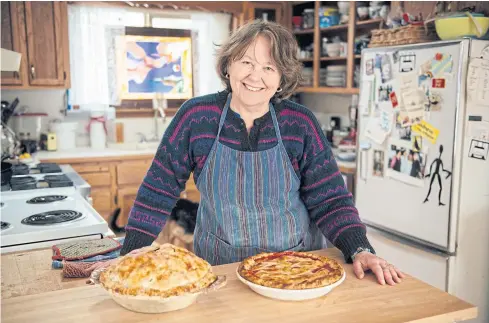  ??  ?? Kate McDermott with apple and sour cherry examples of her baking prowess at her home in Port Angeles, Washington.