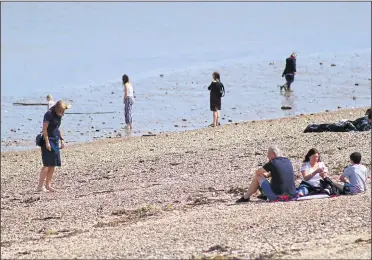  ??  ?? Plenty of people were out for a stroll on The Leas in Minster, Sheppey, after the lockdown restrictio­ns were eased last week