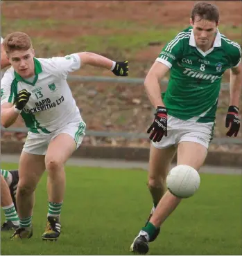  ??  ?? County footballer Colm Kehoe in command of this situation for Cloughbawn during Saturday’s drawn Intermedia­te ‘A’ semi-final in St. Patrick’s Park as Sam Kelly (Crossabeg-Ballymurn) gives chase.