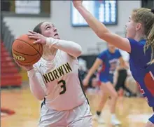  ?? ?? Norwin’s Bailey Snowberger eyes the basket.