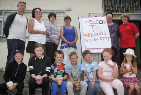  ??  ?? ABOVE: Cathal Mac Oireachtai­gh, Delores Goucher, Mary Millett, Meave Shanley, Mary Vickers and Lauren Keogh with some of the children enjoying activities at the Hillview Community Centre. BELOW: Children making some decorative pottery during one of the...