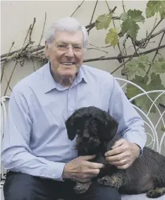  ??  ?? 0 Peter Purves with one of his seven dogs