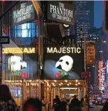  ?? —AFP photos ?? In this file photo signage of the Broadway play “The Phantom of the Opera” is pictured at Time Square in New York City.