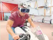  ??  ?? SIMULATOR Fraser tries ‘riding’ with 3D VR goggles