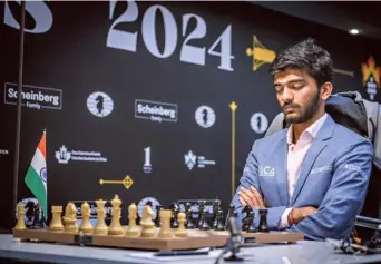  ?? FIDE ?? Giving his all: Gukesh’s draw with Nepomniach­tchi was based on intelligen­t opening selection.