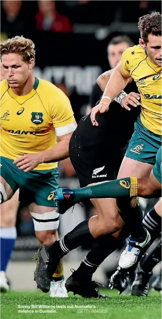  ??  ?? Sonny Bill Williams tests out Australia’s defence in Dunedin.