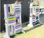  ??  ?? UPCYCLED Old pallets into planters