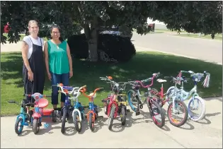  ?? SUBMITTED PHOTO ?? Most recently the Cycle Guild of Medicine Hat donated 10 bikes of varying sizes to Saamis Immigratio­n.