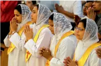  ??  ?? Devotees attend a prayer at St Mary’s Catholic Church in Sharjah.