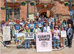  ?? ?? Climate protesters outside Coventry Council House on Tuesday