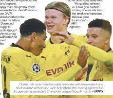  ?? – AFPPIX ?? Dortmund’s Jadon Sancho (right) celebrates with teammates Erling Braut Haaland (centre) and Jude Bellingham after scoring against Club Brugge during yesterday’s Champions League Group F match.