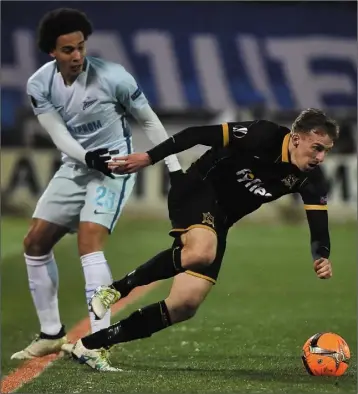  ??  ?? David McMillan gets away from Zenit St Petersburg star Axel Witsel.