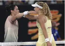  ?? AFP ?? Mirra Andreeva, right, is congratula­ted by Ons Jabeur after their second round match at the Australian Open