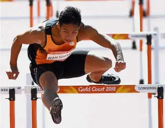  ??  ?? Up and over: Malaysia’s Rayzam Shah Wan Sofian bagged another bronze medal in the 110m hurdles event during his stint in the US.