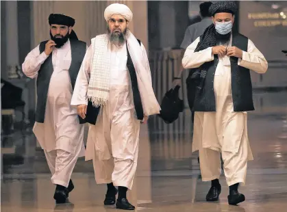  ?? REUTERS ?? Members of Taliban political office Abdul Latif Mansoor (right), Shahabuddi­n Delawar (center) and Suhail Shaheen arrive for a news conference in Moscow, Russia, on Friday.