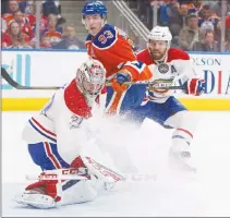  ?? Canadian Press photo ?? Montreal Canadiens goalie Carey Price (31) makes the save on Edmonton Oilers centre Ryan Nugent-Hopkins (93) as defenceman Shea Weber (6) defends during second period NHL action in Edmonton on Sunday.