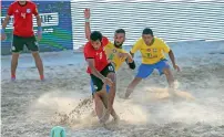  ??  ?? Egypt’s Moustafa Shaaban in action against Brazil’s Bruno Xavier.