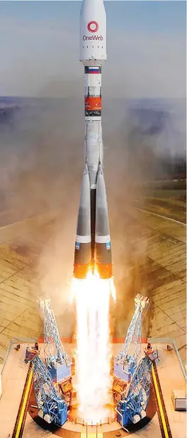 ?? ?? Lift-off: A rocket heads for space with 36 OneWeb satellites