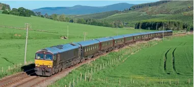  ?? Andrew Bannister ?? GB Railfreigh­t’s 66746 climbs to Kennethmon­t on the former Great North of Scotland main line from Aberdeen to Keith working 1H79, the 13.43 Edinburgh to Keith Branch Junction ‘Royal Scotsman’, on the evening of June 5. This line sees very few locomotive-hauled trains, with the exception of the weekly seasonal ‘Royal Scotsman’ working. This is one of two GBRF Class 66s painted into ‘Royal Scotsman’ livery for use hauling the luxury land-cruise train, with the other being 66743.