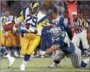  ?? ASSOCIATED PRESS FILE ?? The top five all-time singleseas­on rookie rushing leaders:
1. Eric Dickerson, L.A. Rams, 1983 1,808
2. George Rogers, Saints, 1981 1,674
3. Ezekiel Elliot, Cowboys, 2016 1,631
4. Alfred Morris, Redskins, 2012, 1,613
5. Otis Anderson, St. Louis...