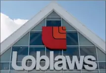  ?? The Canadian Press ?? A Loblaws store is seen in Montreal. Shoppers eager to apply for a $25 gift card offered in the wake of the company’s admission of fixing the price of bread products are questionin­g the authentici­ty of the website they are being asked to register with.