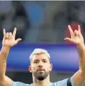  ?? Photo / AP ?? Sergio Aguero signals to the fans after completing a hat-trick for Manchester City against Chelsea.