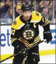  ?? ?? In this file photo, Boston Bruins’ Patrice Bergeron is shown during the first period of an NHL hockey game against the Pittsburgh Penguins in Boston. (AP)
