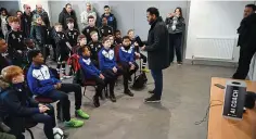  ??  ?? Youth policy: children learn about the AI coach at Wingate &amp; Finchley