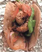  ?? CAROL DEPTOLLA/MILWAUKEE JOURNAL SENTINEL ?? A grilled-shrimp taco for Lent at La Dama in Walker’s Point also includes a traditiona­l Mexican dried-shrimp patty, guajillo pepper sauce and nopales.