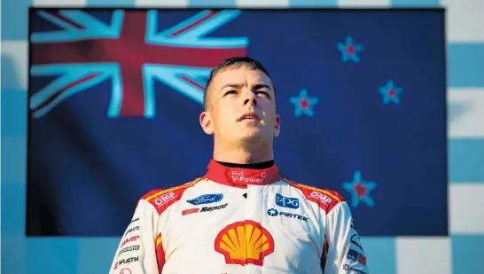  ?? Photo / Getty Images ?? Scott McLaughlin on the podium in Melbourne after making it three wins from three races in 2019 yesterday.