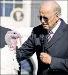  ?? ?? Tradition: The prez pardoning Chocolate, 2022’s National Thanksgivi­ng Turkey.