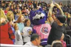  ?? Christian Abraham / Hearst Connecticu­t Media ?? Fans cheer during a hockey game at Webster Bank Arena in Bridgeport in October.