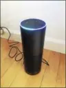  ?? JOE AMARANTE — REGISTER ?? The Echo glows blue as Alexa tells a joke.