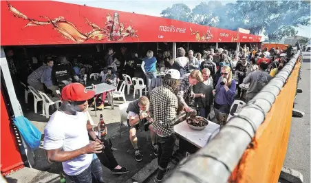  ?? PICTURE: DAVID RITCHIE/AFRICAN NEWS AGENCY (ANA) ?? STEAK-OUT: Renowned Gugulethu restaurant, Mzoli’s, draws tourists and locals alike. But the provision of tourism products based on cultural resources in townships remains limited.