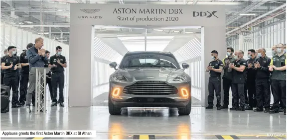  ?? MAX EAREY ?? Applause greets the first Aston Martin DBX at St Athan