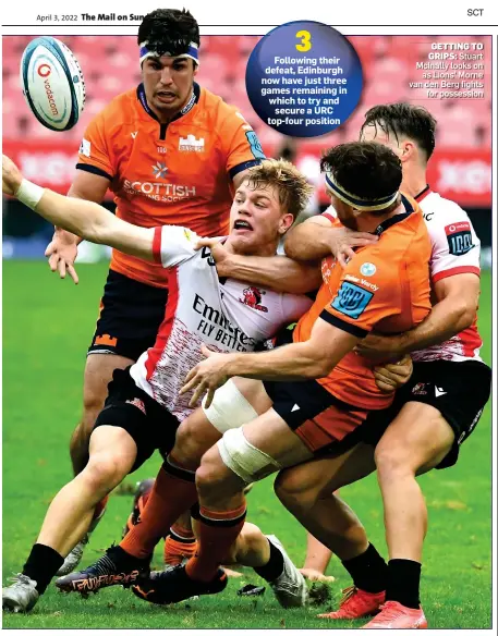  ?? ?? GETTING TO
GRIPS: Stuart McInally looks on as Lions’ Morne van den Berg fights for possession