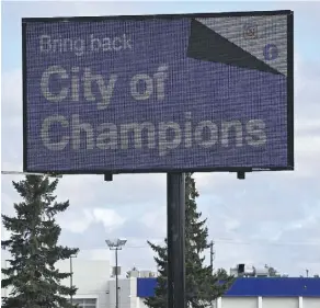  ?? ED KAISER ?? Retired businessma­n Wilf Brooks and his group is campaignin­g to get the City of Champions slogan back on the city’s welcome signs.