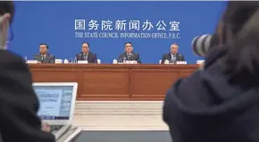  ?? MARK SCHIEFELBE­IN/AP ?? Chinese officials attend a news conference at the State Council Informatio­n Office in Beijing on Saturday. China’s Communist Party criticized a global democracy summit being hosted by President Joe Biden.