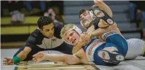  ?? JANE THERESE/SPECIAL TO THE MORNING CALL ?? Lehigh’s Max Brignola wrestles Bucknell’s Aiden Davis on Friday at Lehigh University’s Leeman-Turner Arena at Grace Hall in Bethlehem.