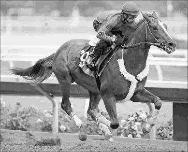  ?? BARBARA D. LIVINGSTON ?? Golden Dragon works five furlongs under Evin Roman in 58.91 on Monday at Del Mar.