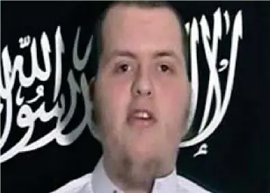  ??  ?? Radicalise­d: Lewis Ludlow in front of an Islamic State flag in a YouTube video