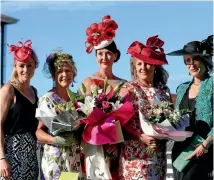  ?? PHOTO: MARTIN DE RUYTER/FAIRFAX NZ ?? Contestant­s and judges is last year’s best hat competitio­n at the Nelson Harness Club’s summer racing festival.