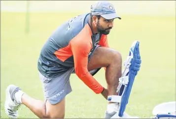  ??  ?? Captain of India’s T20 team Rohit Sharma puts on his pads for batting at the nets during team’s practice session in Kolkata on Saturday