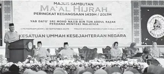  ??  ?? PERDANA Menteri Datuk Seri Najib Tun Razak (kiri) berucap pada sambutan Ma’al Hijrah 1439/2017 Peringkat Kebangsaan di Masjid Sultan Ismail Petra pada Jumaat.