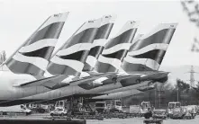  ?? Frank Augstein / Associated Press ?? British Airways’ London-to-Glasgow trip exposed problems of zero-carbon goals as demand begins to rise.