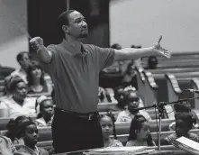  ?? Houston Chronicle file ?? Damon Gupton was the guest conductor for the Houston Symphony’s movie-themed concert in The Woodlands.