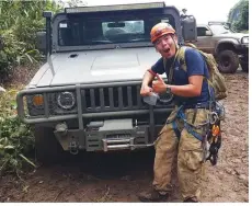  ?? CEDJIE AQUINO FACEBOOK ?? DE-STRESSING. Christoffe­r John "Cedjie" Aquino playing it up to the camera outside the Tham Luang Nang Non cave system in Chian Rai, Thailand, after one of their exploratio­ns of crevices that can be used as passages.