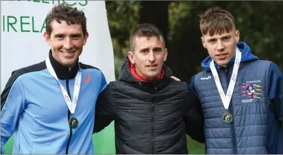  ??  ?? Brendan Boyce of Finn Valley AC, Donegal, left, David Kenny of Farranfore Maine Valley AC, Kerry, and Rob Heffernan, centre, following the Irish Life Health National 20k Walks Championsh­ips at St Anne’s Park in Raheny, Dublin.